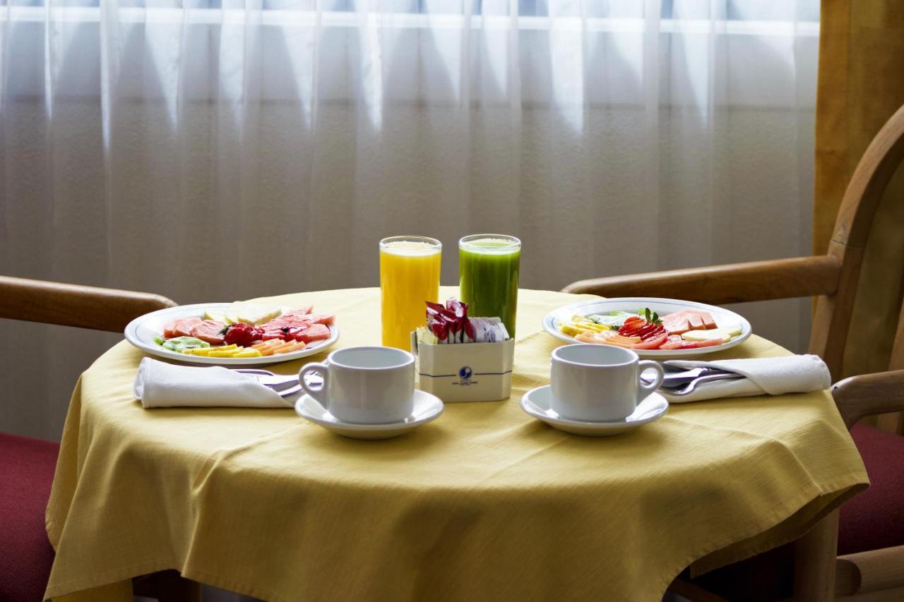 San Juan Park Hotel San Juan del Río Dış mekan fotoğraf A light breakfast